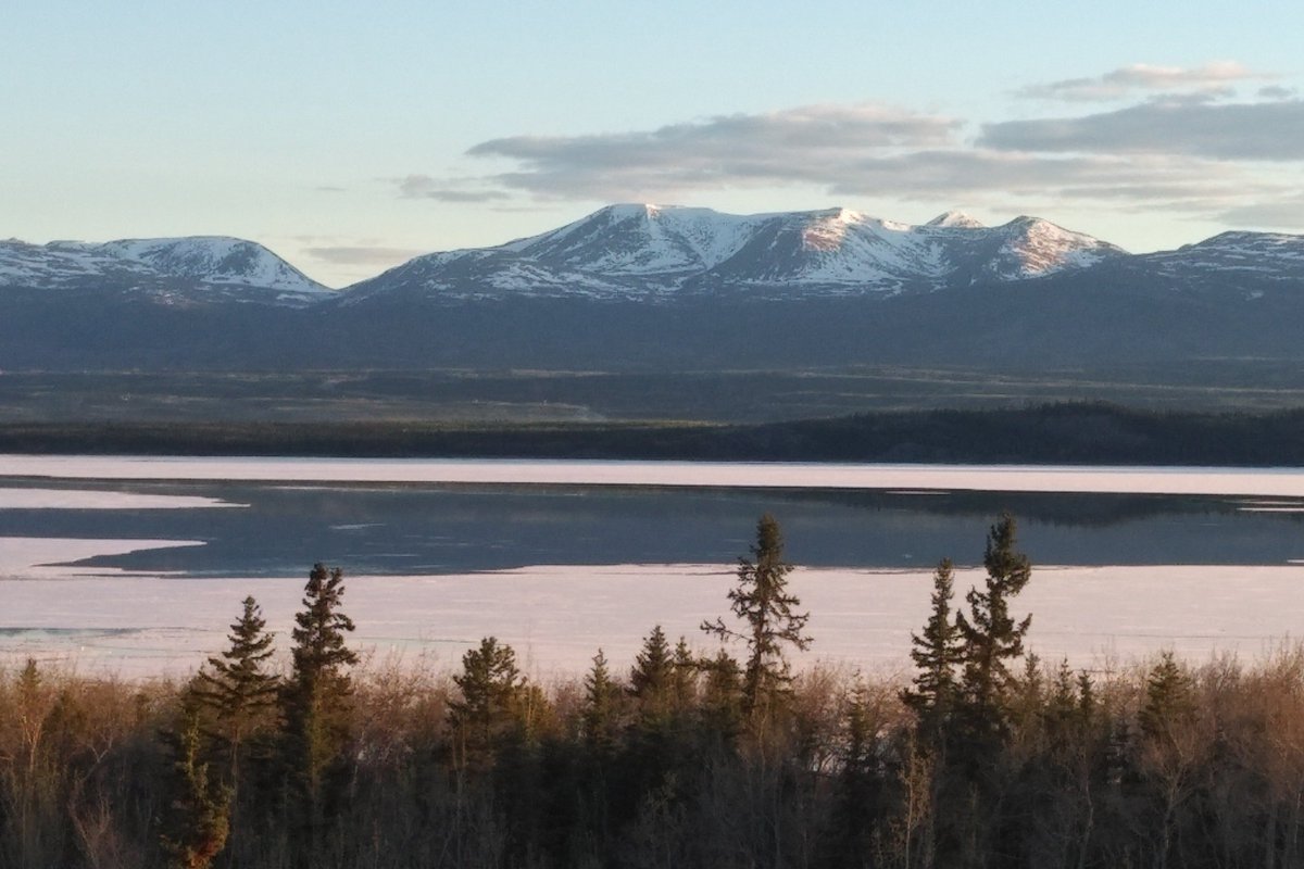 Open water starting to show through the ice on Lake Laberge