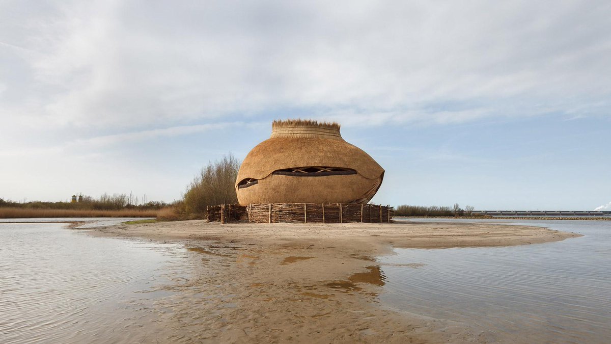 Thatched reeds cover egg-shaped observatory for watching birds: RAU Architects and Ro&amp;Ad Architects have designed the egg-shaped Tij Observatory for the Scheelhoek Nature Reserve in Stellendam, the Netherlands <a href="/rau_architects/">RAU</a> <a href="/roadarchitecten/">RO&AD Architecten</a> dezeen.com/2019/05/11/tij… <a href="/dezeen/">Dezeen</a>