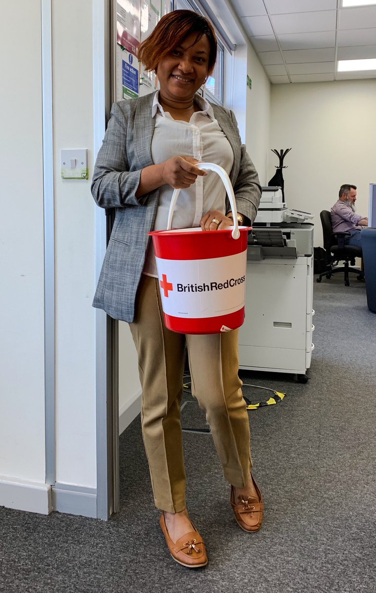 Huge thanks to Dolapo from CEMAS who’s raised nearly £130 at Humanity House in Nottingham from organising quizzes and activities (and hit me up with her bucket this morning 🤓) Great job! #RedCrossWeek #BigBucketShake #PowerOfKindness ⁦<a href="/BritishRedCross/">British Red Cross 🧡</a>⁩