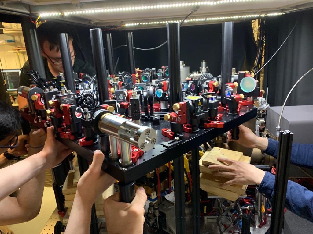 CaMBQD's tweet photo. A few months ago #TeamQuasicrystal had a vacuum leak and all their optics had to be removed so they could bake the chamber. But theyβve made an amazing recovery, have seen #ColdAtoms again, and today we put the most important breadboard back in place!#RealTimePhys #Teamwork https://t.co/zHKvn4OZtx