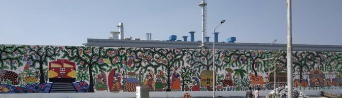 WabtecCorp's tweet photo. We have built a world class locomotive factory in Marhowra, Bihar. The design integrated local folk art #Madhubani into this picturesque depiction of a modern industrial setting. https://t.co/ELPWlgdIhT