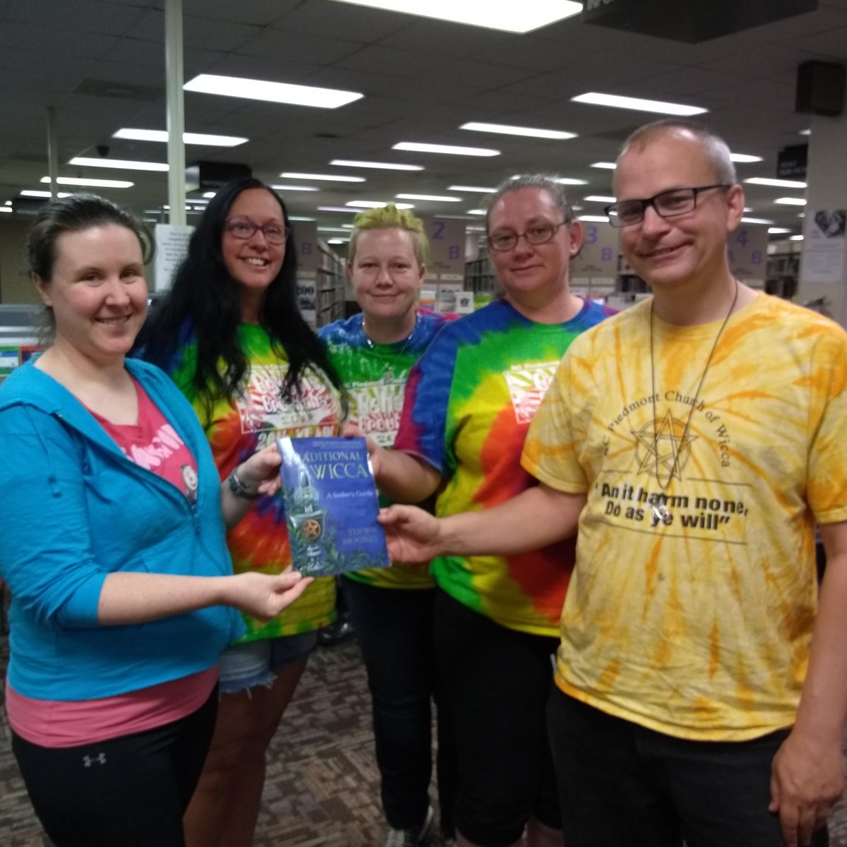 NCPCOW's tweet photo. After our quarterly business meeting this weekend HP Shawn Whitney &amp; HPs Robin Deal presented Cleveland County Memorial Library with  a copy of "Traditional Wicca, A Seeker's Guide" by Thorn Mooney, @TarotSkeptic .
Make sure to check it out! #WitchesRead #SupportYourLocalLibrary https://t.co/YjKryM5S9C