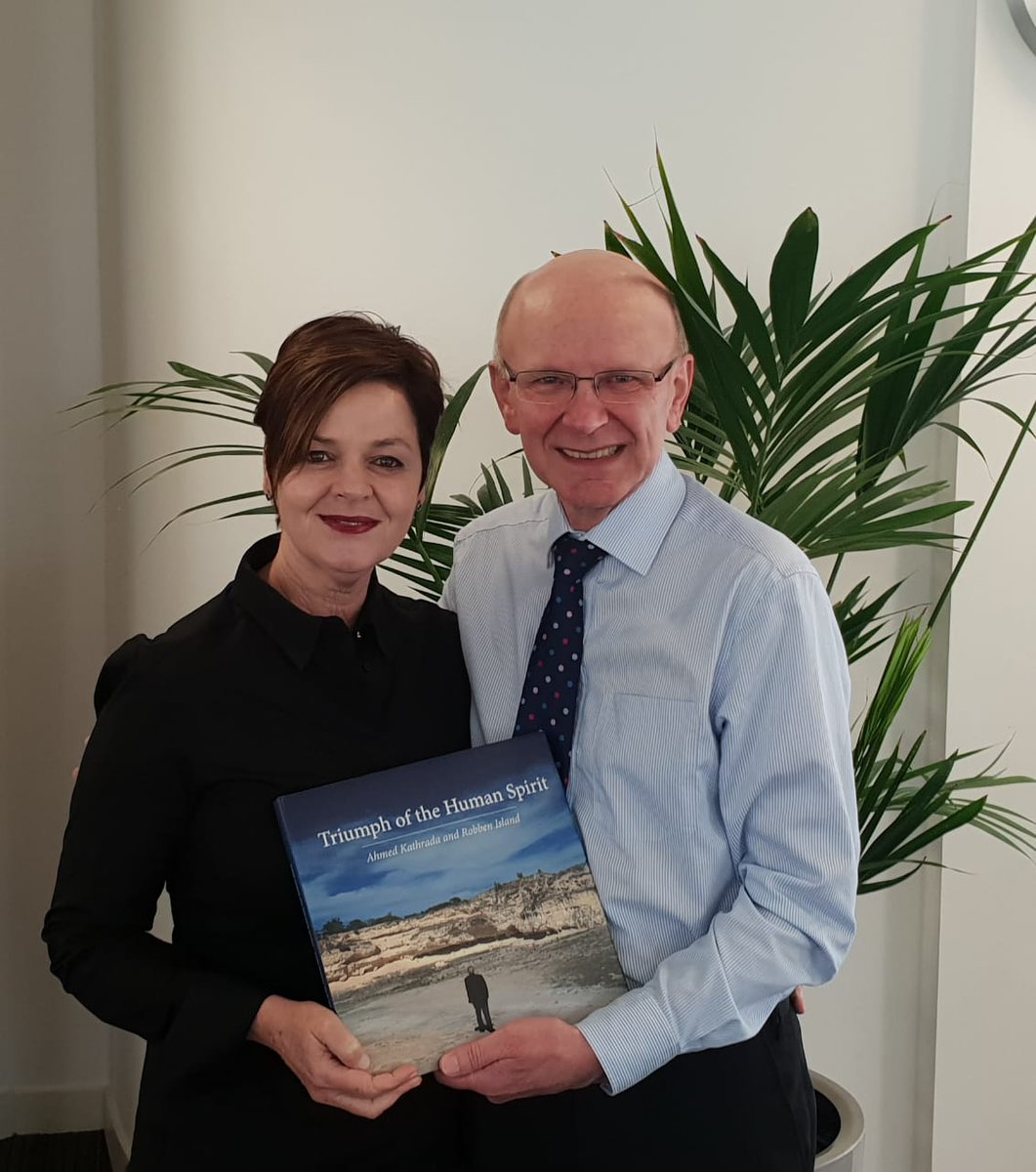 On behalf of the CAFSA Board of Directors, Gill Bates was pleased to present Sir John Low, CEO of CAF UK, with a signed copy of Ahmed Kathrada's (Uncle Kathy's) book, 'Triumph of the Human Spirit'.

<a href="/cafonline/">CAF ONLINE</a>