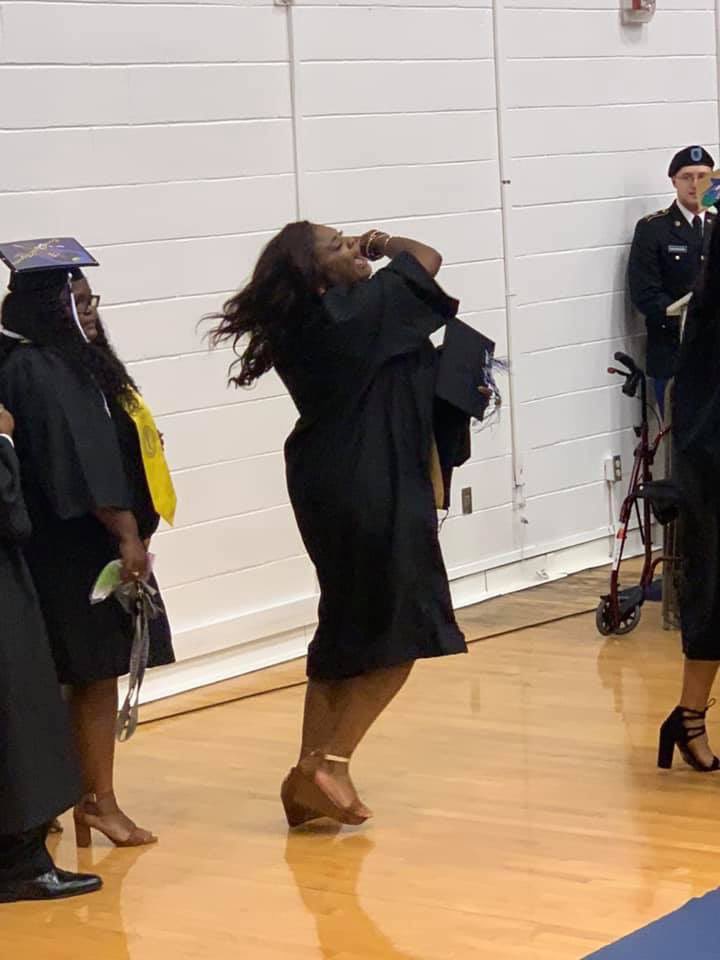 snowhope228's tweet photo. Y’all remember my shouting sister from @ECSU Graduation well this is how she came in 😂😂 Praise him TT! That cap never stood a chance. #ecsugrad https://t.co/OBn3188jQA