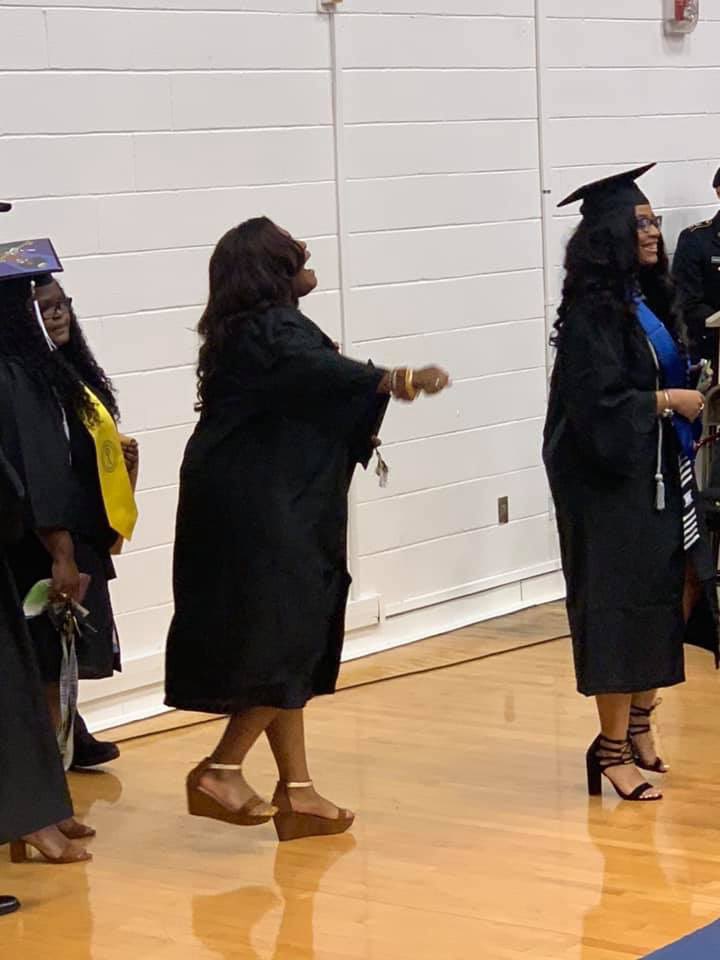 snowhope228's tweet photo. Y’all remember my shouting sister from @ECSU Graduation well this is how she came in 😂😂 Praise him TT! That cap never stood a chance. #ecsugrad https://t.co/OBn3188jQA