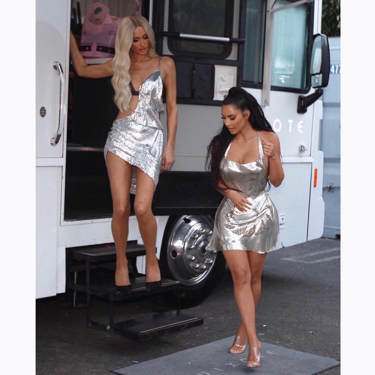 KimKardashian's tweet photo. So fun shooting this video with @parishilton for her new song #BestFriendsAss 🍑💎 https://t.co/NHPKmxxZJD
