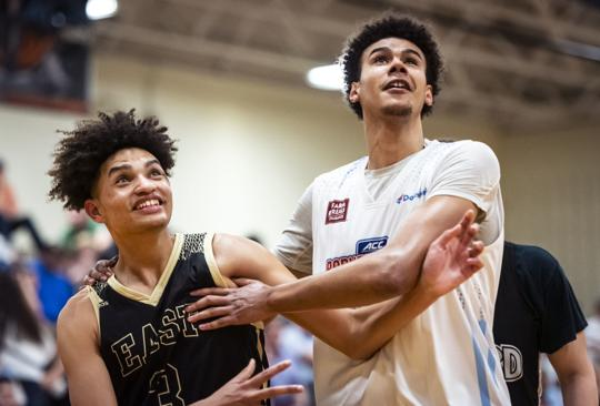 ACCBarnstorming's tweet photo. East Davidson’s Jay Shepherd attempting to block out North Carolina’s Cam Johnson on April 11 during the ACC Barnstorming Tour at North Davidson High School!  🏀 🏀 https://t.co/mHTZqTNhdA
