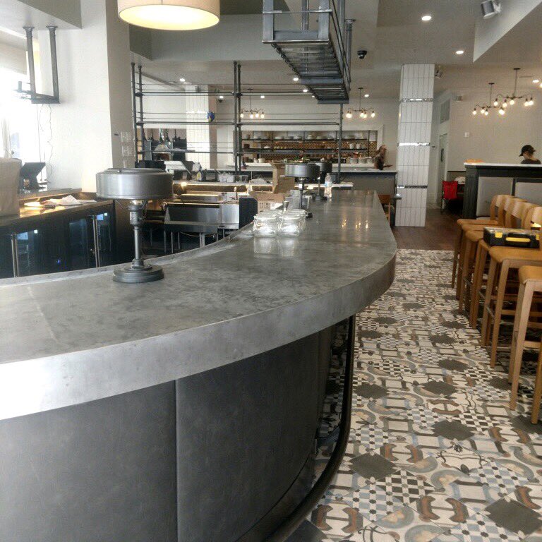The latest live finish bar top in zinc was the biggest ; 48 foot and horseshoe shaped. Upholstered panels by <a href="/constructnola/">CONSTRUCT</a> in collaboration with @labadot_construction #zinc #livefinish #metalfabrication #bardesign #commercialdesign #interiordesign #restaurant #restaurantdesign
