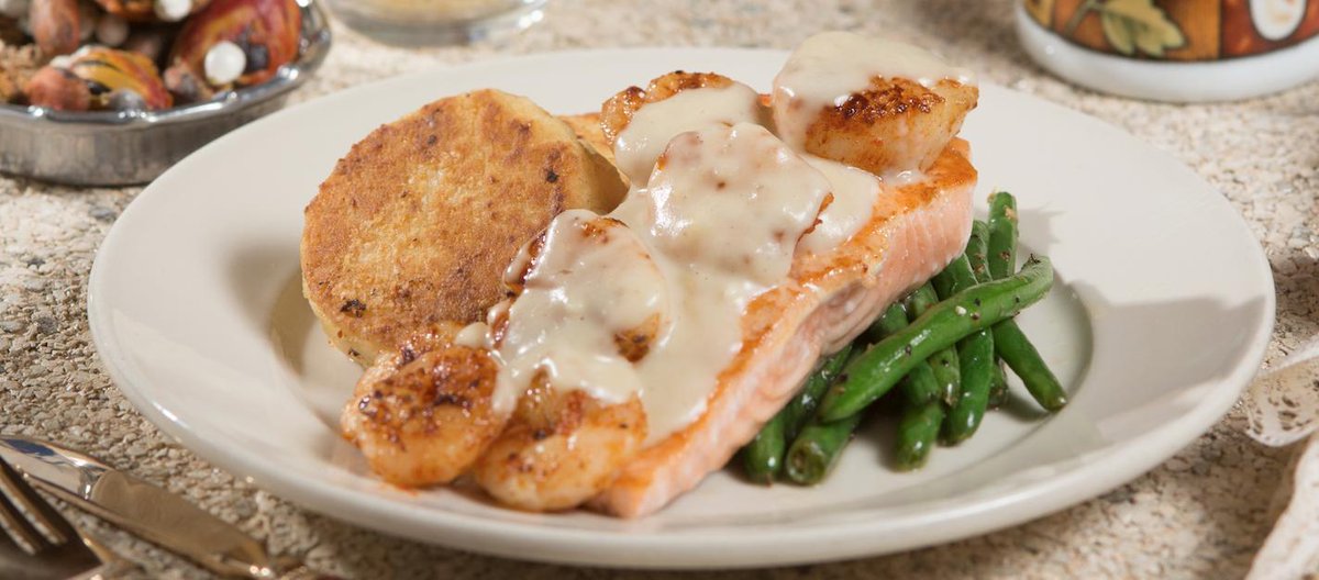 The Salmon Pontchartrain is one of the Blue Marlin's favorite low country classics. With a mornay sauce spread over our fresh salmon fillet, this dish is sure to have your mouth watering. Come on by today to try this delicious low country classic!