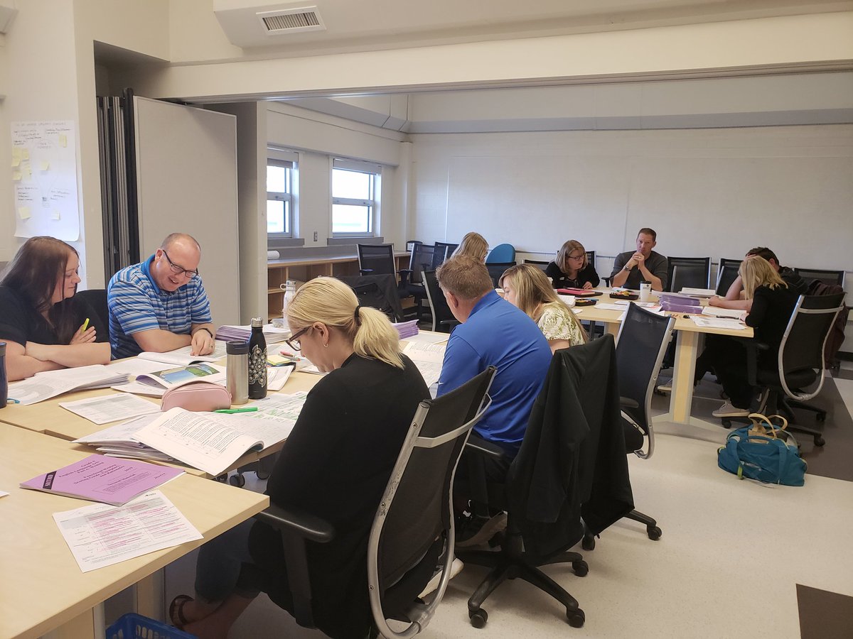 BRSDLiteracy's tweet photo. @battleriver31 Day 1 of 2 of District local marking of ELA PAT 6 begins! These teachers are pensively analyzing rationales &amp; criteria. Great discussions so far! #literacymatters #assessmentmatters #fivedaysinMay https://t.co/gkeVxWslku