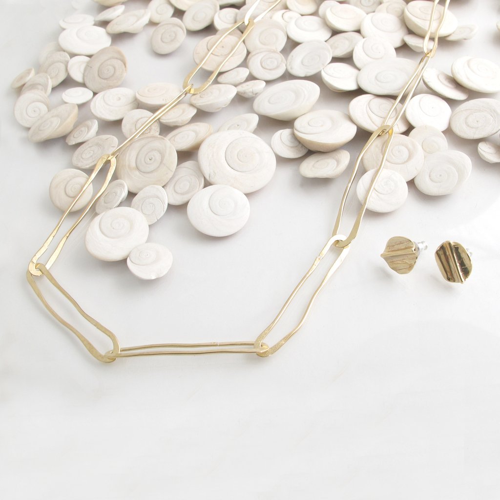 Wavy, irregular loops and forms, because perfect is boring. Each piece is made, hammered and textured by hand by me to create a truly one one a kind piece of jewellery for you. 
#boholuxe #bohogirls #prettylittleiiinspo #bohojewels #instaboho #bohogypsytribe #prettylittlelayers
