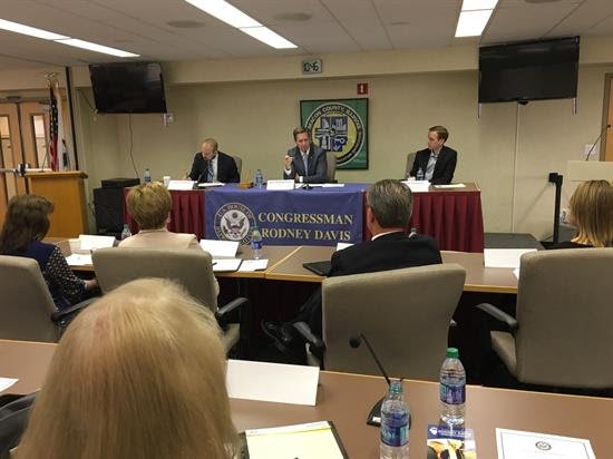 JoeBReporter's tweet photo. INBOX: "@RodneyDavis Holds Bipartisan Election Security Roundtable with Local County Clerks." But the picture sent by Davis' office shows the tables appear to be rectangular. #roundvsnotround #il13 https://t.co/FL8VozPiFv