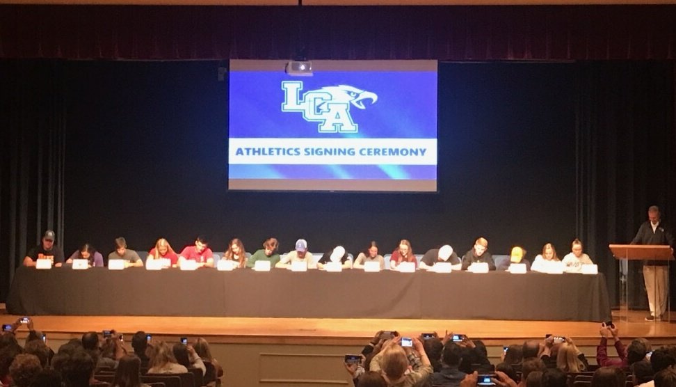 LCAathletics's tweet photo. Signing ceremony 2019 in the books! 16 student-athletes playing in college this fall! @HLpreps @PrepSpin @lcasoftball @sharptalons @LCABaseball @LCAFootball2019 @LCACoachV @lcacheerleading @LCA_Dance @LCABoysGolf @LCA_GirlsBBall @KeithFarmer18 @BKennedyTV @brianwkyt @LCAKYEagles https://t.co/sWoAKp3zTF