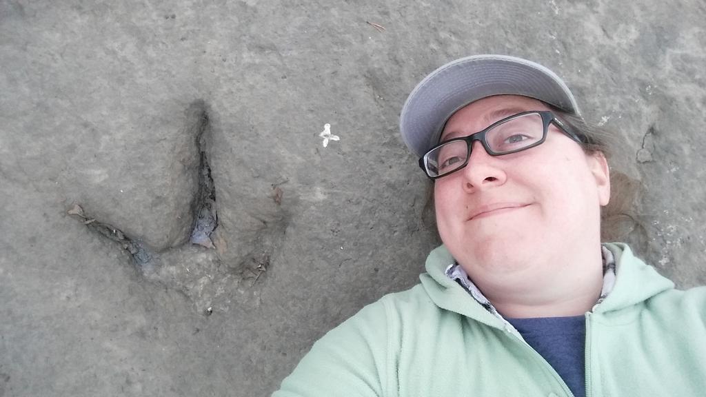 VictoriaArbour's tweet photo. Ok one more slightly goofy photo from today's visit to the Six Peaks site. It's hard to take selfies with dinosaur footprints! #CSVP2019 #BCfossils https://t.co/WkyH9YUNQT