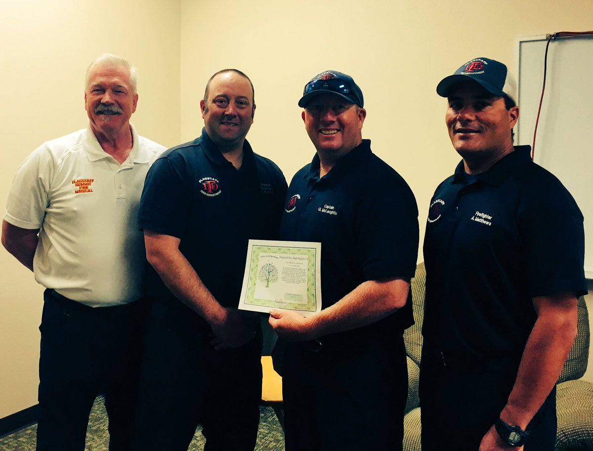 Chief_FFD's tweet photo. Grateful and proud to present @FlagstaffFire E3 crew with recognition from our partner @GuidanceCenter for their compassionate care leading to a save. R-L FF Anthony Matthews Cap Greg McLaughlin Eng Chris Romero #AmazingExamples to all of us https://t.co/owg0dgLeyn