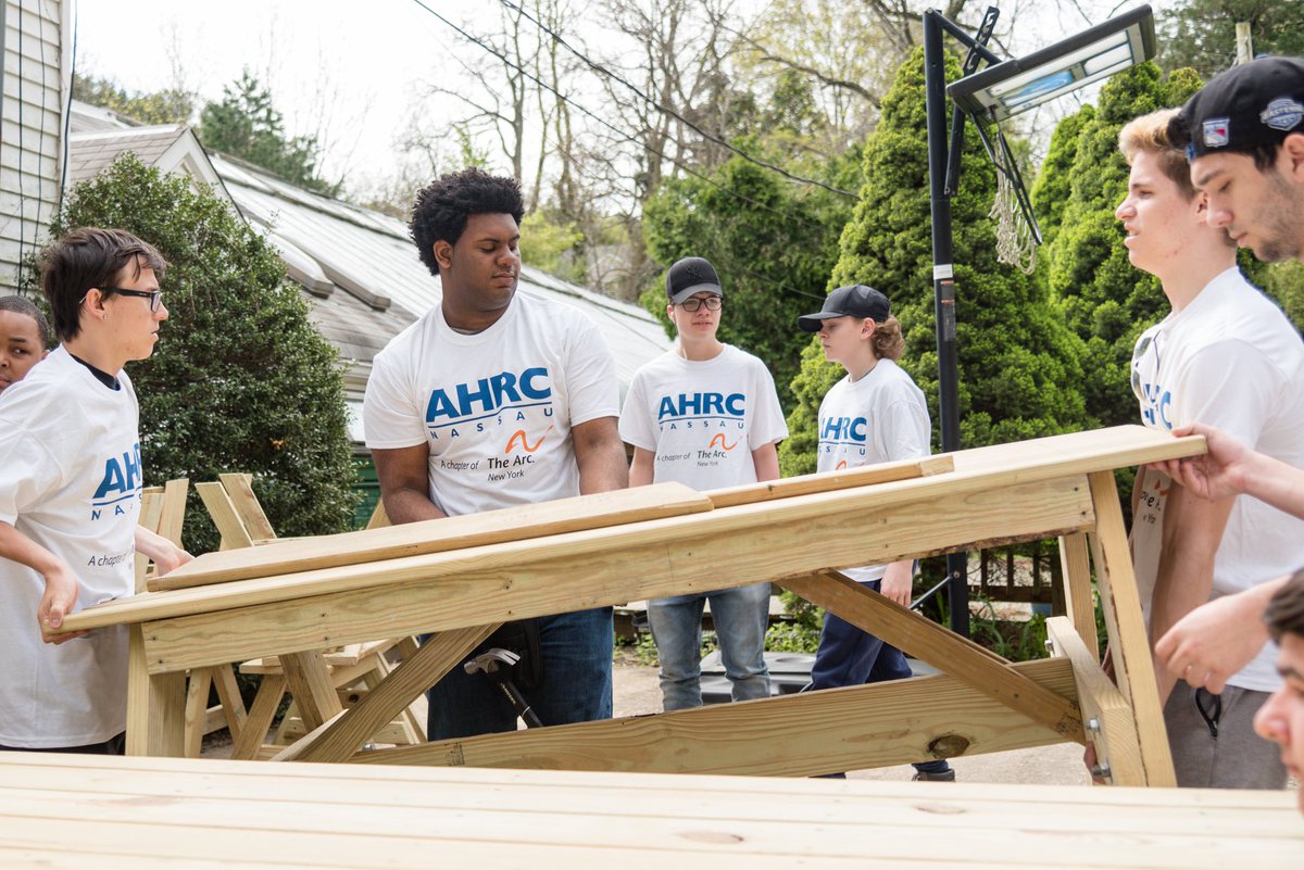 NassauBOCES's tweet photo. As part of the AlticeUSA #AlticeConnects Charity of Champions program our #BarryTech Construction Trades students, lead by Anthony Ianucci, crafted benches, planters, handicapped-accessible picnic tables and a solar powered, self-watering chicken coop for @AHRCNassau farm. https://t.co/Z732HsLuPP