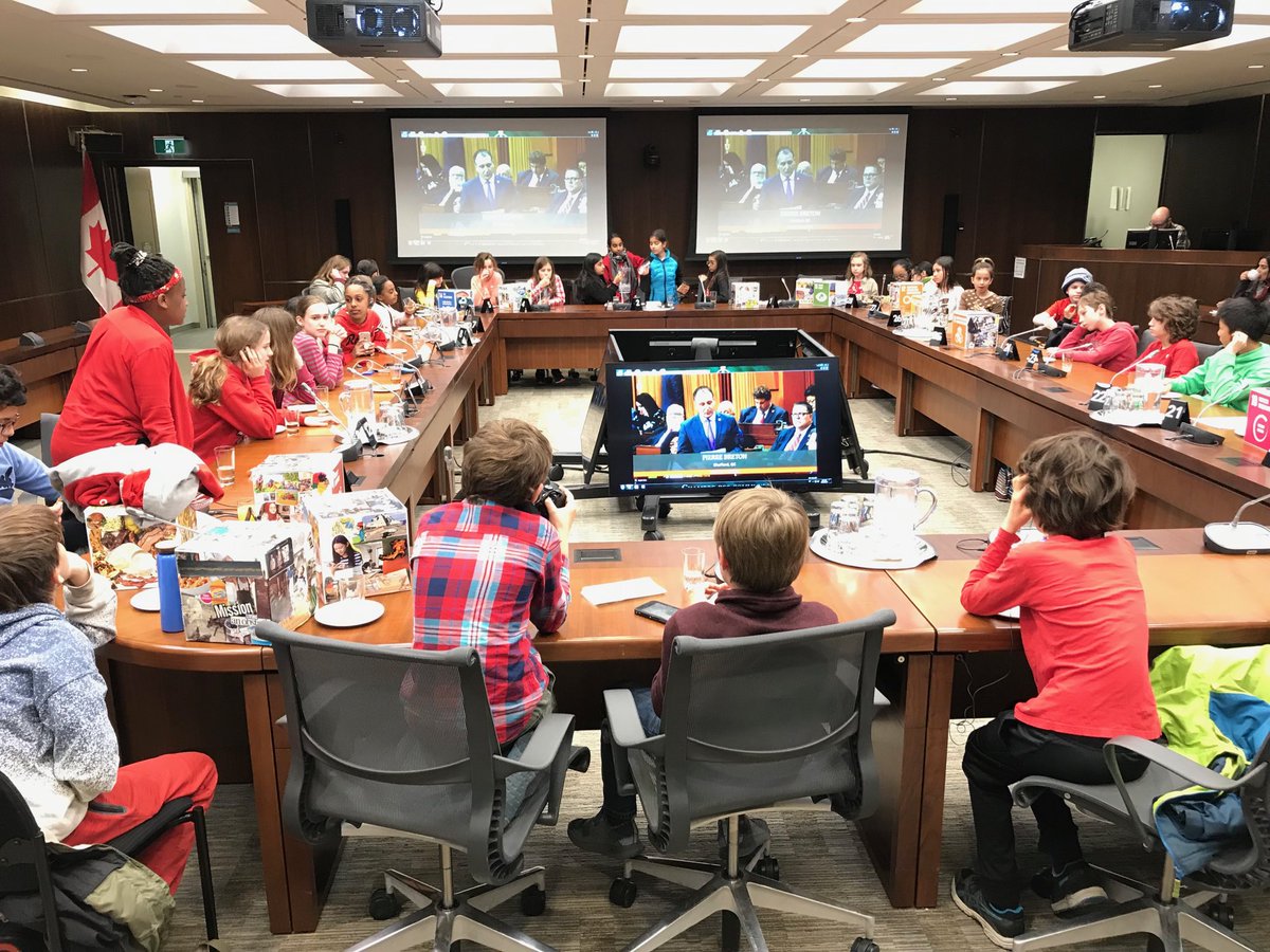 MKs4SDGs's tweet photo. Breaking from our mtgs w/ MPs for cookies 🍪 from ⁦@JulieDzerowicz⁩ and #QuestionPeriod...live-stream on screens means the Millennium Kids can cheer! They just spotted ⁦@MaryamMonsef⁩ sitting behind ⁦@JustinTrudeau⁩ on the screen. 🙂 https://t.co/lxAjbA9pVt