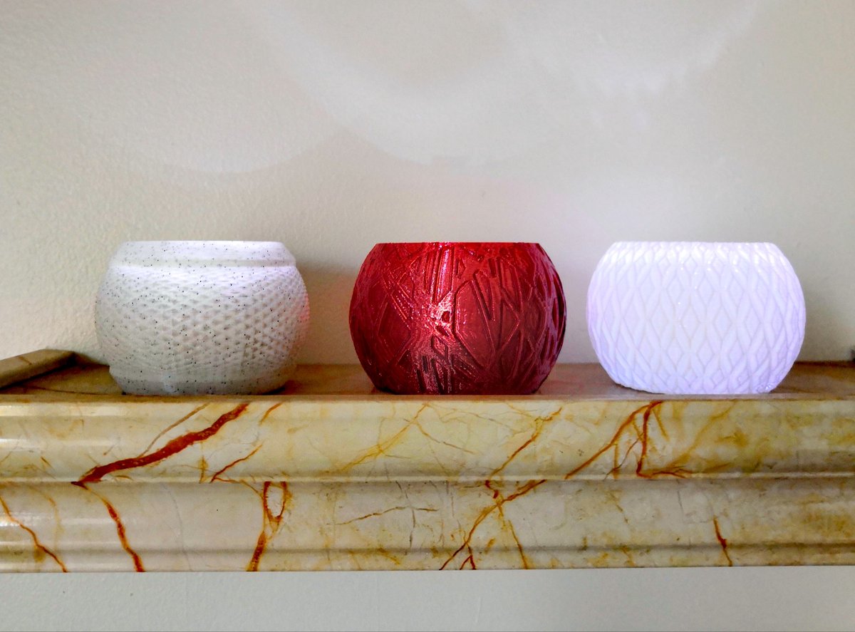 GinaManchul's tweet image. Using @ferjerez3d striped vases models as tea light holders for bathroom never disappoints! Printed in @rigidink marble and white pla and red petg #practicalprinting