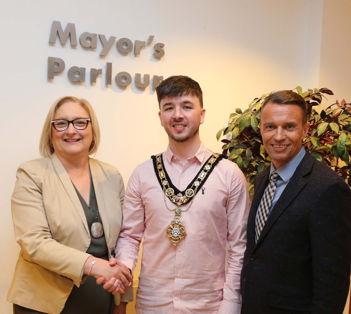 The newly appointed Mayor of Causeway Coast and Glens Borough Council Councillor Sean Bateson pictured being congratulated by outgoing Mayor Councillor Brenda Chivers and Chief Executive David Jackson following the Annual Meeting this evening.