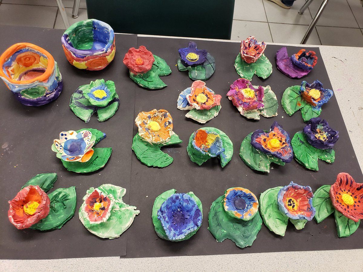 DionAllison's tweet photo. Clay painting week is finally here!  Students favorite time in art class!  2nd grade made Monet waterlilies, 3rd grade made koi fish in pinch pot bowls.  #clay #sculpture #elementaryart #artteacherlife #create #kidsart #painting https://t.co/Lj7jkSg2az