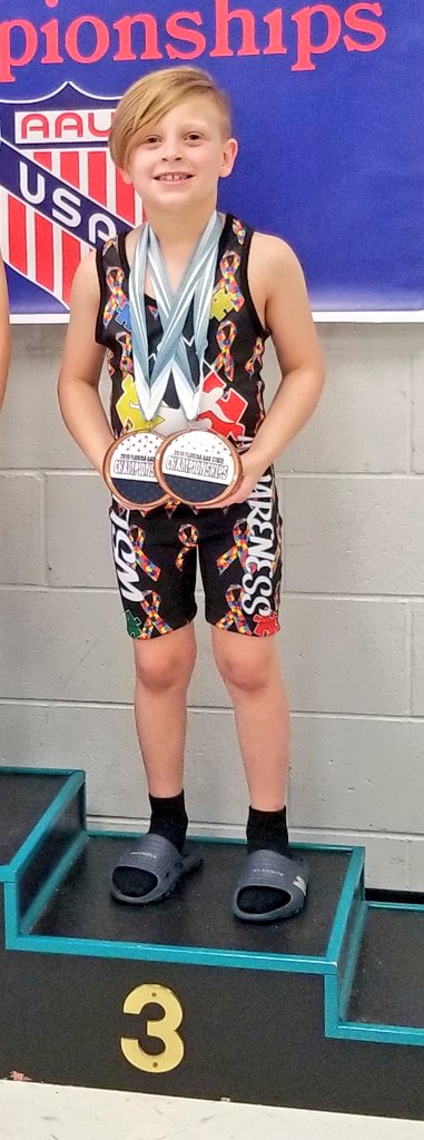 Mykele3's tweet photo. So proud of this kid!! Took 3rd place in his Spring State Wrestling Championships! All while repping his Autism Awareness singlet for his cousin! 8 yrs. old &amp; so smart &amp; tough! #parentingwin #LiamPatrick #ClayBlueDevils #ClayWrestling https://t.co/oZLgCQtbNU