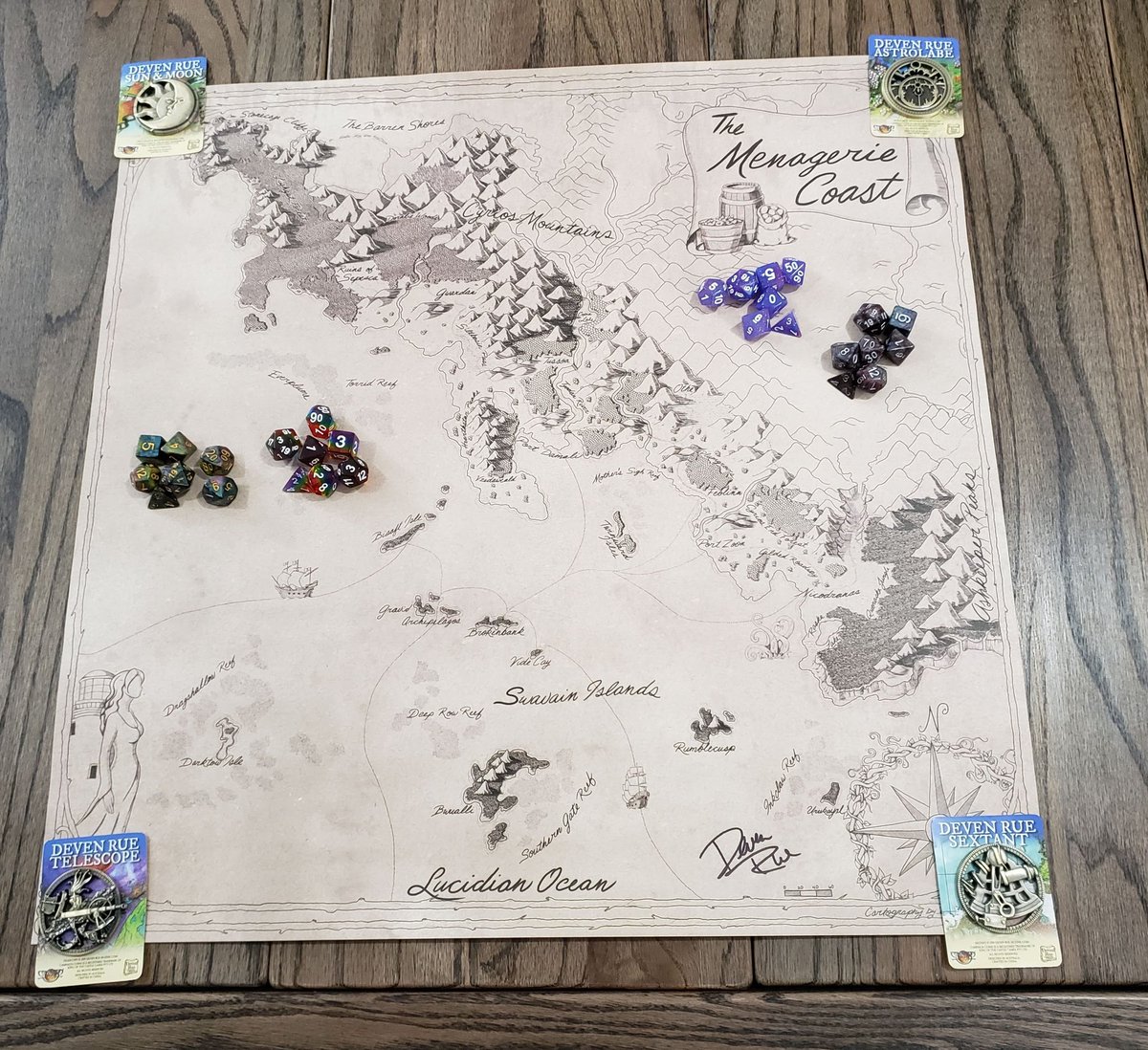 TabletopLoot's tweet photo. Ever heard of @TearableMonster? 

To help them we're doing a giveaway! 
1:Follow them
2:RT this tweet

For a chance to win an AUTOGRAPHED @DevenRue map of the #MenagerieCoast from @CriticalRole, the dice, &amp; map weights!

Drawing: May 25th at 9PM CDT
https://t.co/iJI3QGEDRq
#dnd5e https://t.co/jDe5KfJmZL