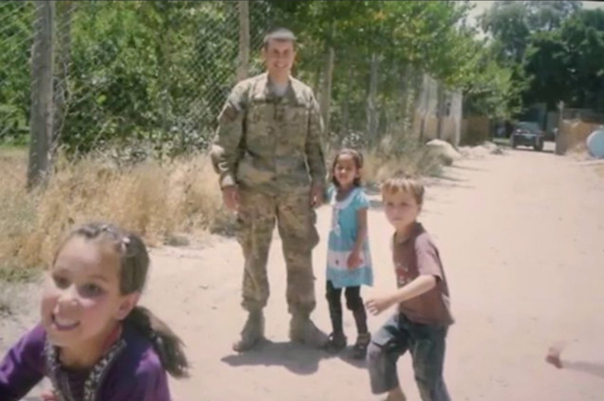 Here's the photo of  @PeteButtigieg that Jimmy Fallon showed. He was on a volunteer mission to deliver supplies to an orphanage in Kabul.The soldier who was with him on that trip was Major Mike Donahue. He was killed in a suicide attack the day after Pete left Afghanistan.