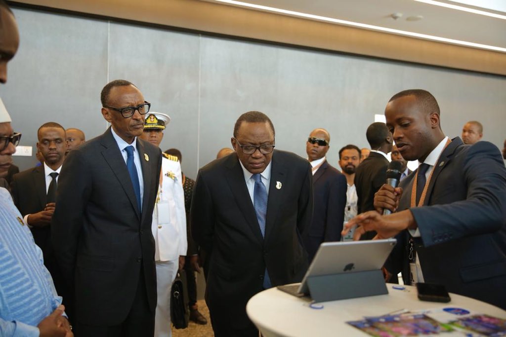 BankofKigali's tweet photo. We are honoured to have H.E @PaulKagame , H.E #UhuruKenyatta from Kenya and H.E #IbrahimBoubacarKeita from Mali at our #TAS2019 stand  as we present to them IKOFI(Bank of Kigali E-wallet with a special focus to the farmers).

#TAS2019 #RwoT https://t.co/73pqzMfoVA