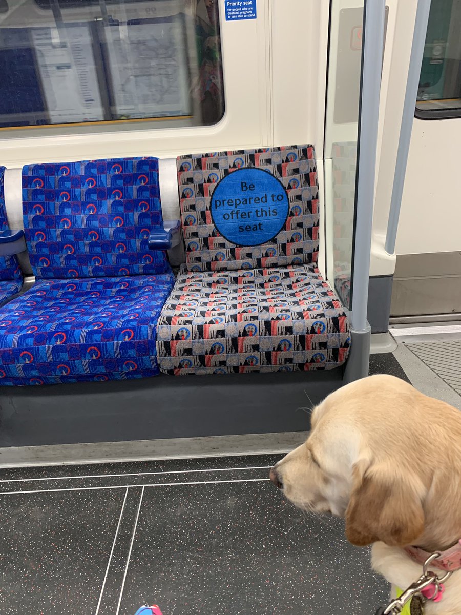 LizzieCapener's tweet photo. The @jubileeline have changed the colour of their #PrioritySeating so they are different from the other seats in the carriage with the words ‘Be prepared to offer this seat’. 
Please #TravelKind and offer your seats to those who are less able to stand than you. @RNIB https://t.co/DreYhN0hJC