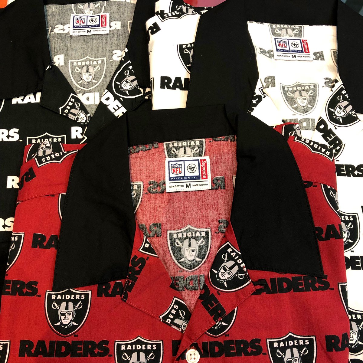 raiders button up jersey