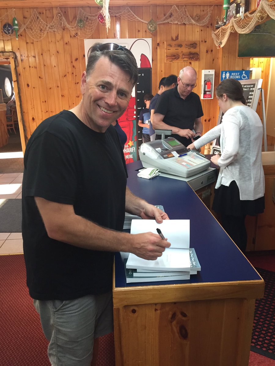 FishrmnsWhrfPEI's tweet photo. We wonder what the next book will bring? A couple of years ago, now Premier Dennis King, signing a couple of books for our Gift Shop! They were flying off the shelf then! Should be near impossible to keep stock this year! #FishermansWharf #WorldFamous #Giftshop #TwoRestaurants https://t.co/3SibpAUS7w