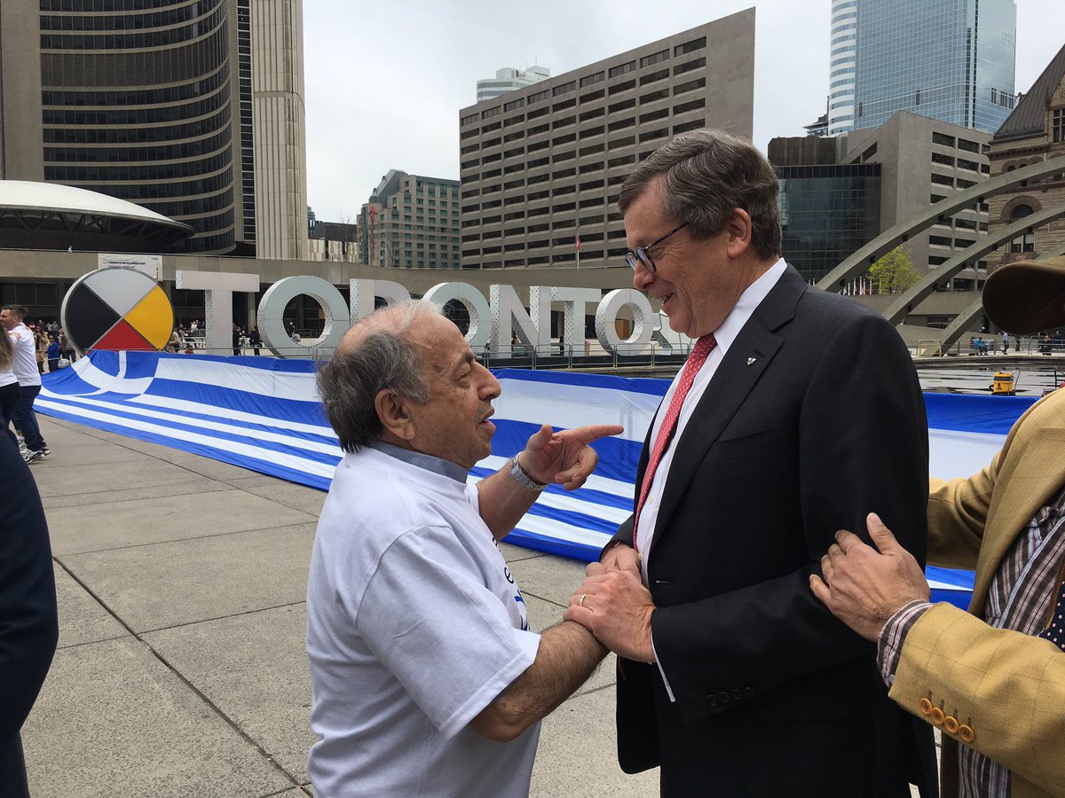 JohnTory's tweet photo. My zorba isn’t nearly as good as my polka but still had lots of fun trying to dance and meeting volunteers for the @GCGFest  this afternoon. Enjoyed celebrating the upcoming Great Canadian Greek Festival taking place next month at the Better Living Centre. #GCGFest https://t.co/LylFFp6vj7
