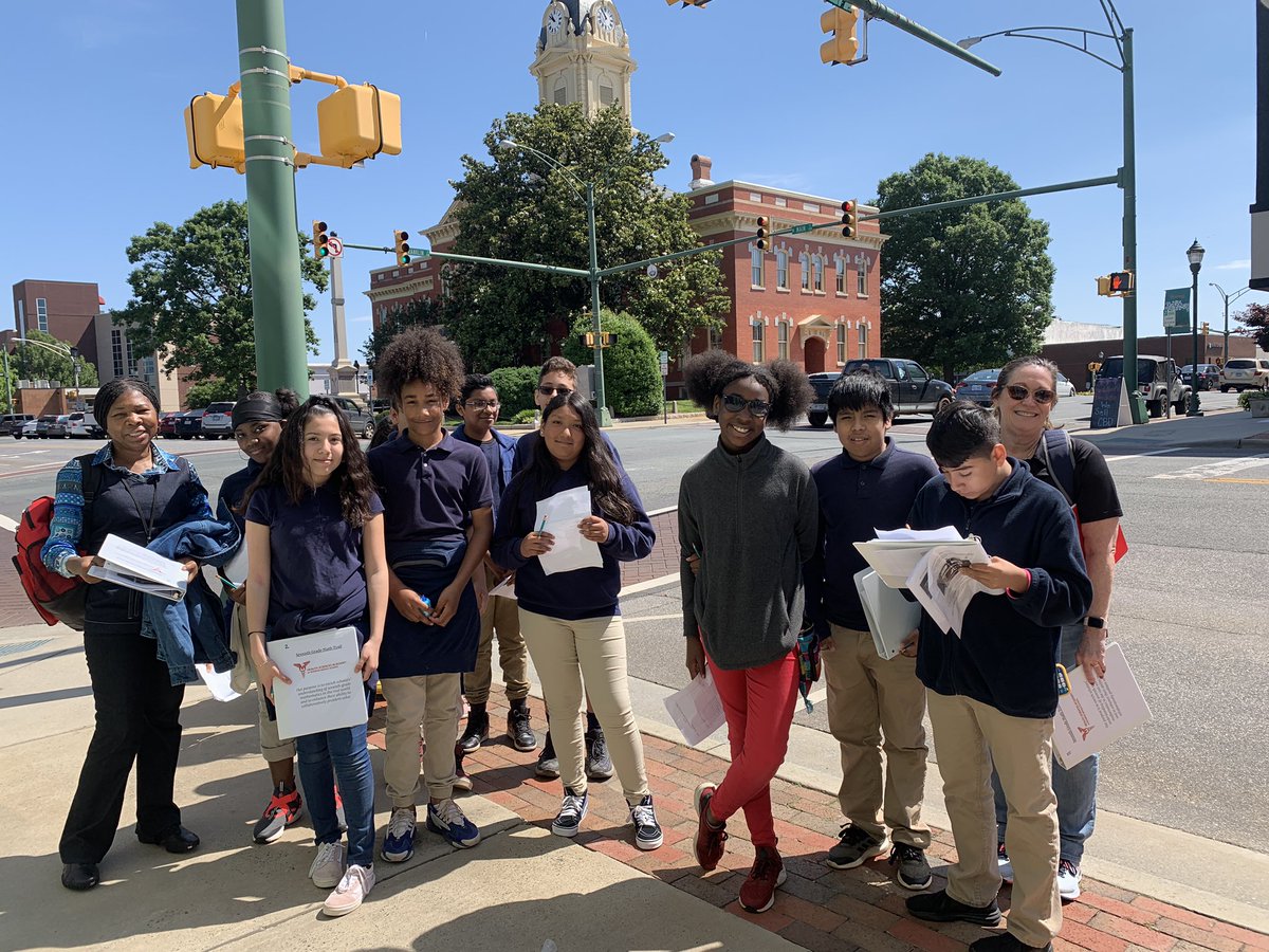 HeartForMonroe's tweet photo. Love seeing our 7th grade @MonroeMS_NC students exploring downtown Monroe during today’s Seventh Grade Math Trail. This unique  adventure allows MMS scholars to use real world situations to enhance their problem solving abilities! #waytogoRedhawks #SeventhGradeMathTrail #EOGprep https://t.co/DVrIx5fljU