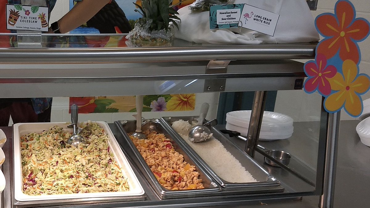 GLPS_rightnow's tweet image. Even lunch is for learning! Alexa Ross -- an MSU intern in the colorful shirt next to GLPS's Carol Jegla -- created a special Hawaiian themed lunch at Hayes: Hawaiian sweet &amp;amp; sour chicken, Hawaiian sticky rice, mango pineapple fruit salsa, tiki time coleslaw, &amp;amp; coconut cupcakes.