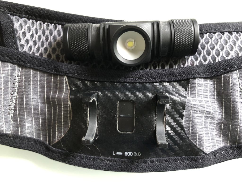 'The UltrAspire Lumen 600 3.0 waist light allows you to take the burden of lighting off your head and move it onto your waist. This 600 lumen lamp is a workhorse that lights up the entire trail in a lightweight, compact, and rechargeable package.' ultrarunnerpodcast.com/ultraspire-lum…
