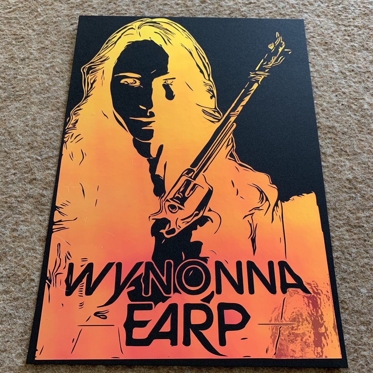 Earper_Jacks's tweet photo. I’ve started learning how to cut things into vinyl, which can then be placed on pretty much anything. This is my first attempt with a person! It’s a slow process but this is cut into holographic vinyl placed on black card 😊 #fanart #wynonnaearp #girlontop #earper https://t.co/hM7WFoTf22