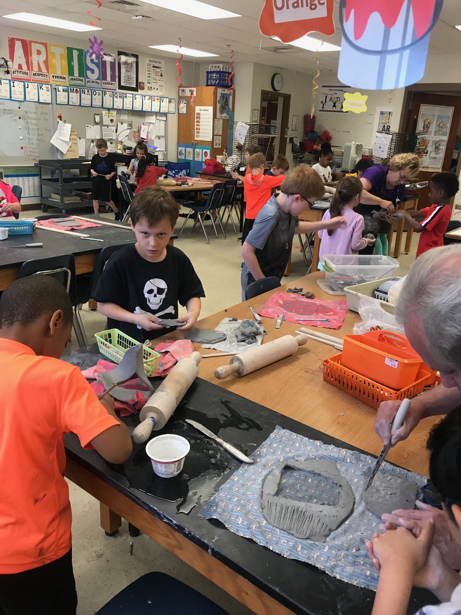 1st grade artists are building those fine motor skills by creating clay wall pockets! 🎨❤️