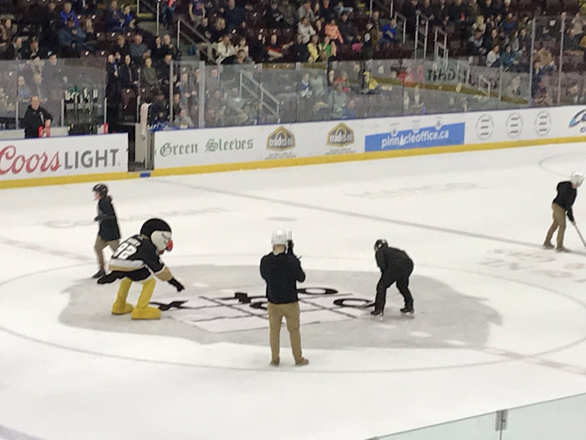 sjboscoschool's tweet photo. SJB kids playing a bit of tic tac toe at tonight’s @NLGrowlers game! Way to go boys! @SheaHgtsCCB https://t.co/usfFn4niYp