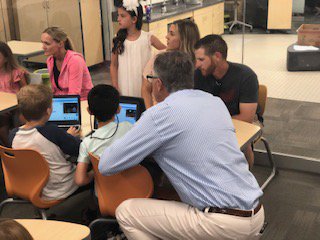 NancyPaddock8's tweet photo. Family fun, sharing SIM learning during Showcase III, @gfeMUSD ! #codetothefuture  #gfeawesome https://t.co/e1KYcuegHg