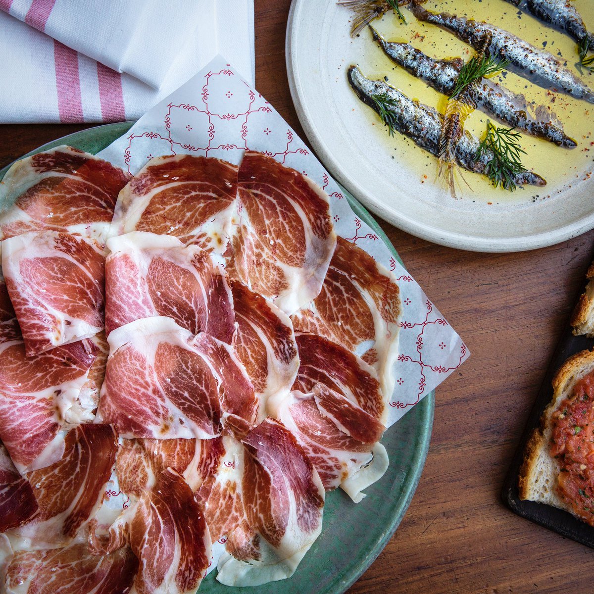 Apertivos that we feel are completely unmissable! Jamon Iberico aged 36 months with Pan Catalan and Cantabrian XXL Anchovies with Fried Spines. #movida