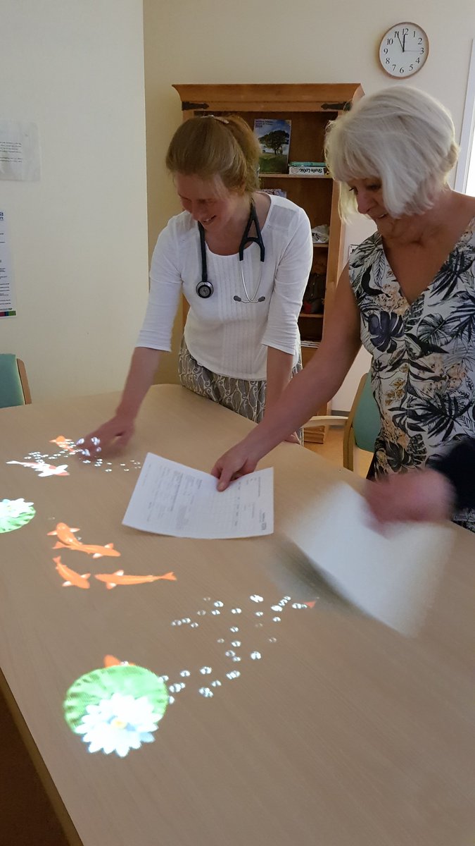 SFTDementiaTeam's tweet photo. Magic Table demonstration Spire Ward. Stimulates cognition, physicality and socialising. Also, improves wellbeing through recognition, fun and reminiscence. Generously funded by The League of Friends. https://t.co/vJINh4rH1g