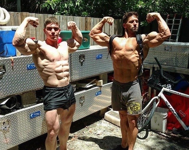 Just two perfectly normal heterosexual lads posing half naked in the yard.p...