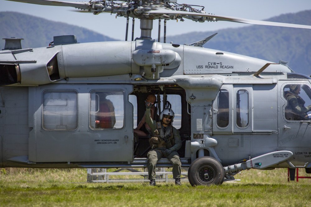 JSOMonline's tweet photo. Are you following the JSOM on Instagram? FInd us @JSOMonline and #jsomonline for a chance to be featured on our feed. This Image: Petty Officer 3rd Class Jose Lopez, an Aviation Weapons Specialist with Helicopter Sea Combat Squadron 12, poses on a SH-60 Seahawk Helicopter. #USMC https://t.co/3stfe1QWD7