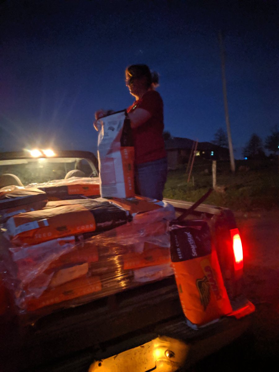 This is my wife. She worked a full day at her job yesterday, went to a parent meeting for my daughter's dance team, fed our bottle calves, and at 10 pm was out in the field helping me fill the planter. Farmers work hard but those supporting us do too!