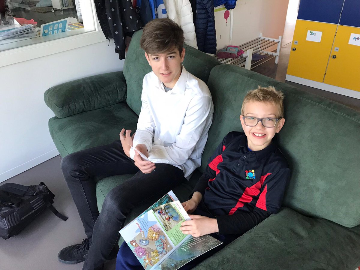 GWASinnovation's tweet photo. G9 students reading with their G3 buddies at @GWASwitzerland. We love working with you! #GWAinspire https://t.co/ve3srb7xae