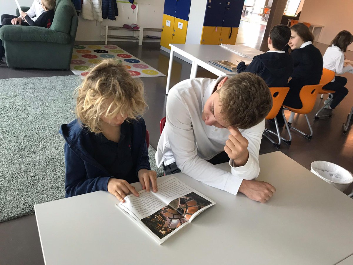 G9 students reading with their G3 buddies at <a href="/GWASwitzerland/">GEMS World Academy Switzerland</a>. We love working with you! #GWAinspire