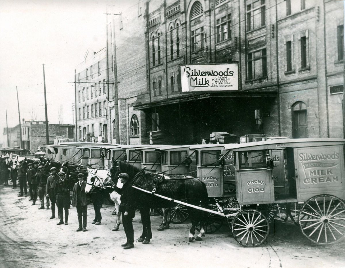 RobinatLFPress's tweet photo. Heard some stories this week about people remembering having milk and bread delivered to their homes . . . so I found this @LFPress file photo of horse-drawn milk wagons that delivered milk to London homes in the 1920s by Silverwood's Milk. #ThrowbackThursday #tbt #ldnont #swont https://t.co/jxz8Tr2Tmz