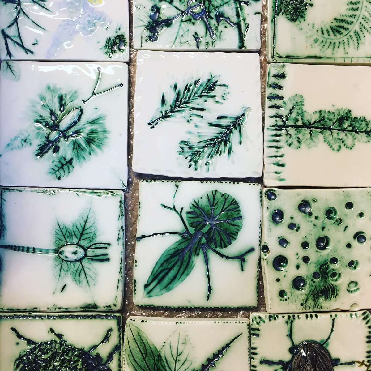 SensoryTrust's tweet photo. Check out these beuatiful tiles from our work with @leachpottery. They were made by kids with disabilities &amp; their families, and will be displayed as part of our new show garden @The_RHS Hampton Court Garden Festival https://t.co/PaXXqGFW8Y