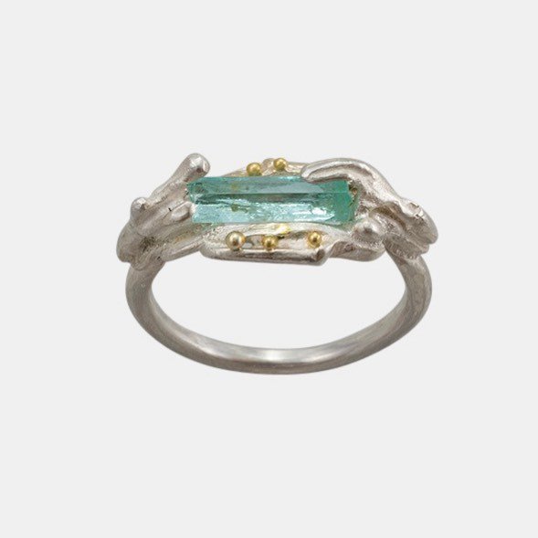 This Molten Emerald ring by <a href="/laurangyou/">Laura Ngyou</a> sounds as good as it looks- rich in texture with silver and contrasting gold clustering around this beautiful emerald. Come and see the rest of Laura’s amazing rings in our exhibition #ringingthechangesexhibition o… bit.ly/2VEwJR8