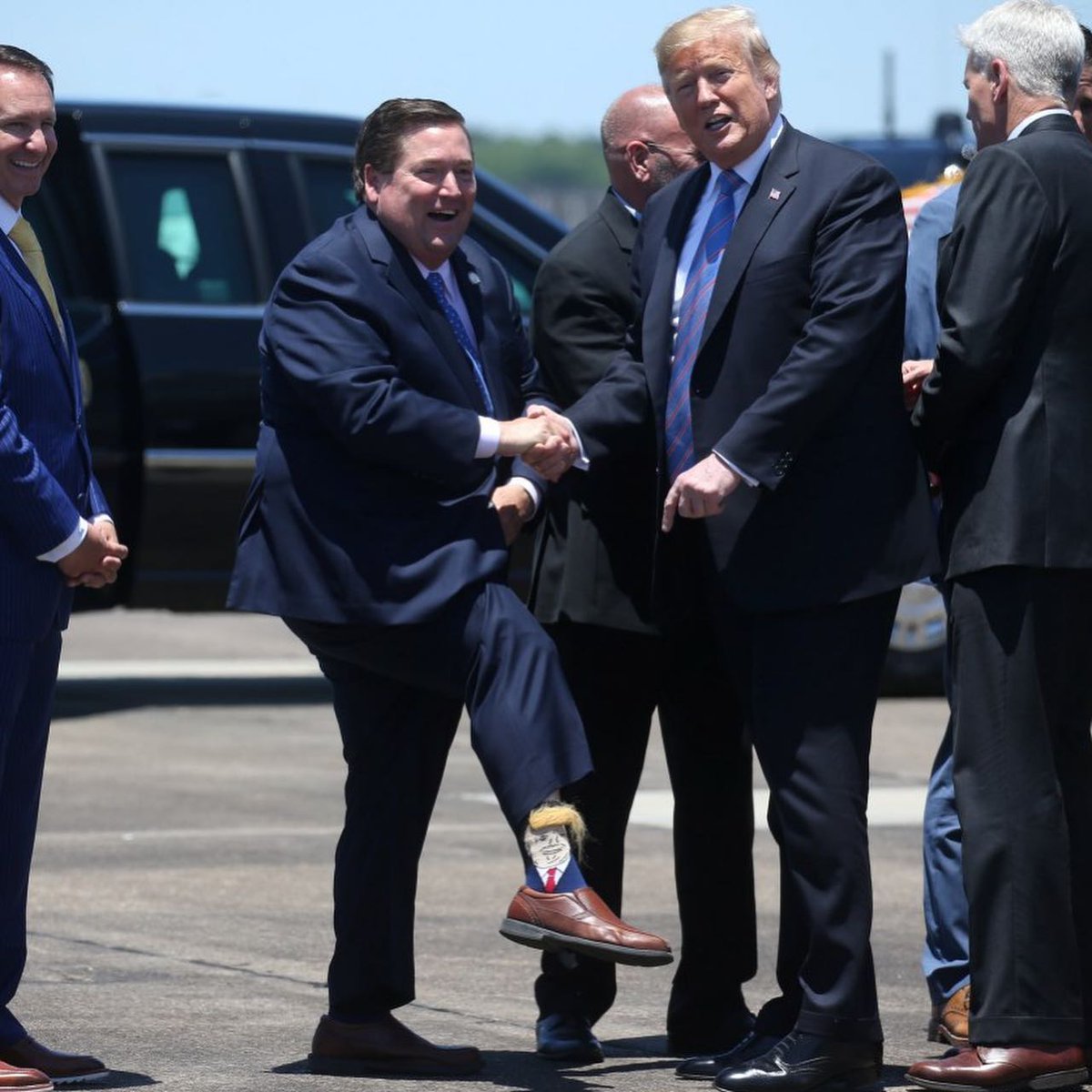 France24_en's tweet photo. 📷 🇺🇸#Louisiana's lieutenant governor put his best foot forward when President #Trump visited, showing off his hairy Trump socks. . . #US #socks #Trumpsocks https://t.co/Yj0S3mtpto https://t.co/F0miIkTYUh